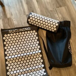 Pressure point mat and pillow with storage bag